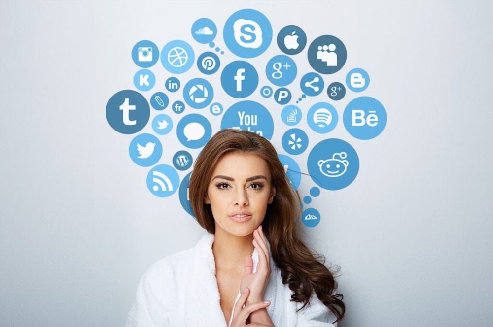 A woman in a white robe with social media icons representing dermatology content marketing