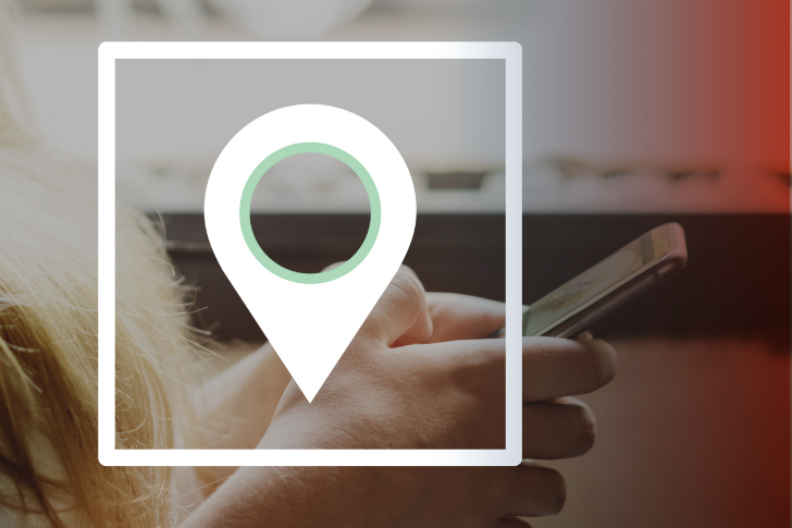 Someone on their phone with a map icon